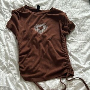 Brown Y2k style shirt.